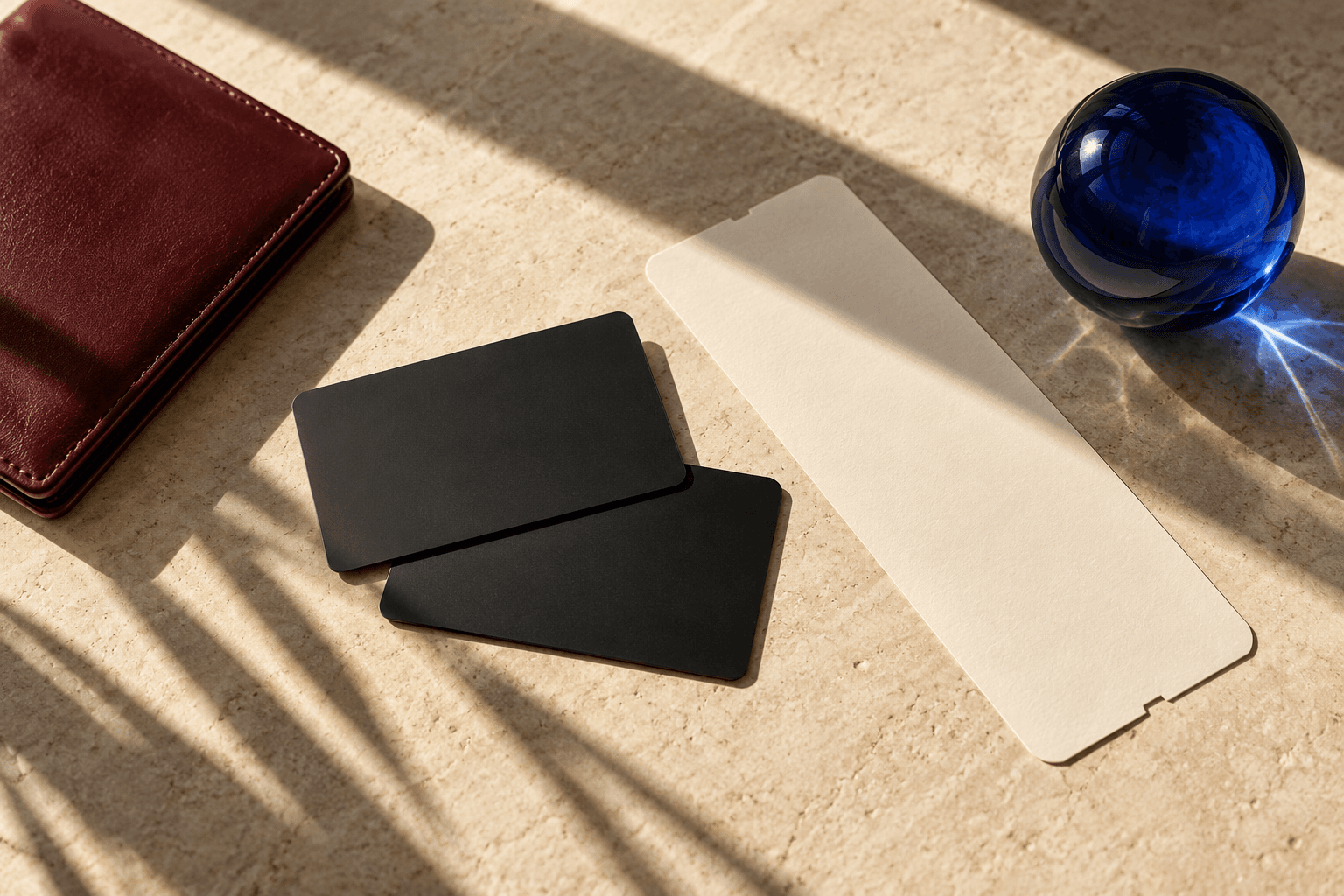 AI-generated illustration of unbranded cards and a travel wallet on stone; no Chase card or Hyatt property shown